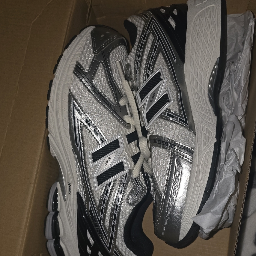 New Balance Metallic Silver and Black Sneakers